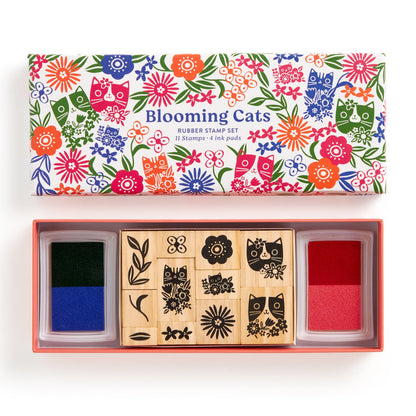 The Tara Lilly Blooming Cats Rubber Stamp Set includes 9 wood stamps with cat and botanical designs, black and red ink pads, all in a boxed set featuring floral motifs on the lid.