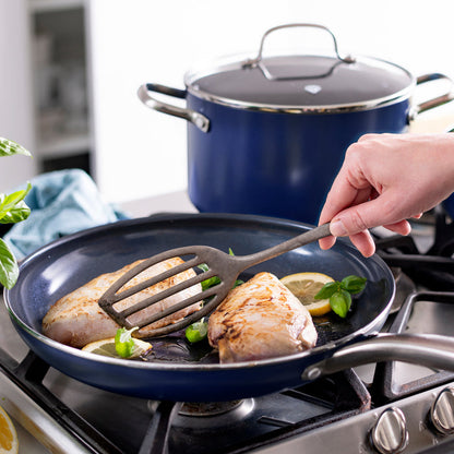 Blue diamond 20 piece on stove cooking chicken in 10 inch fry pan