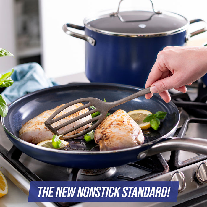 Blue diamond 20 piece on stove cooking chicken in 10 inch fry pan with text that says the new nonstick standard!