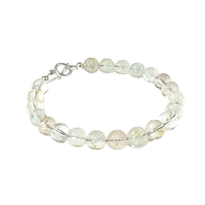 Handmade Blue Topaz gemstone bracelet with sterling silver toggle clasp, November birthstone jewelry on white front view
