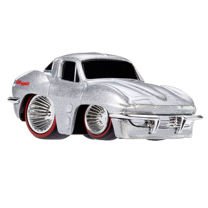 Metallic silver Chevy Corvette toy car on a white background