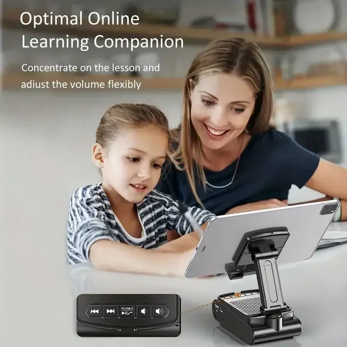A woman and child are sitting at a table with a tablet