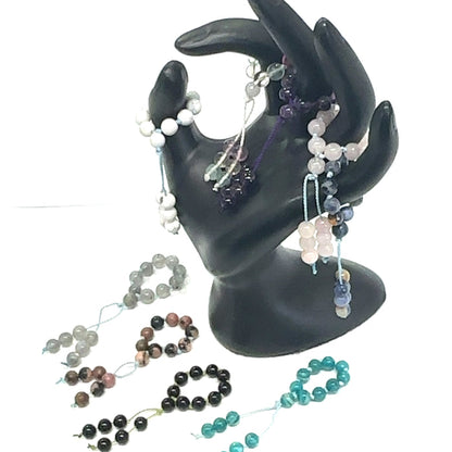 Hand-Knotted Mala Gemstone Rings grouping on white front view