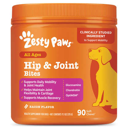 Orange jar of Zesty Paws Hip & Joint Bites dog supplement with yellow dog illustration and purple ingredient list panel.