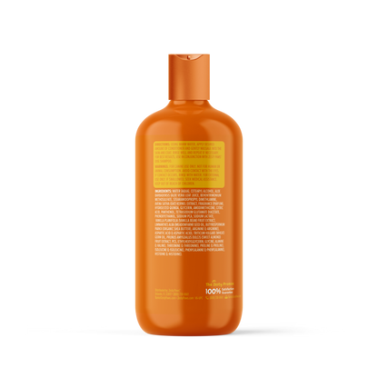 Orange plastic bottle of dog conditioner with yellow and white label text on front and back.