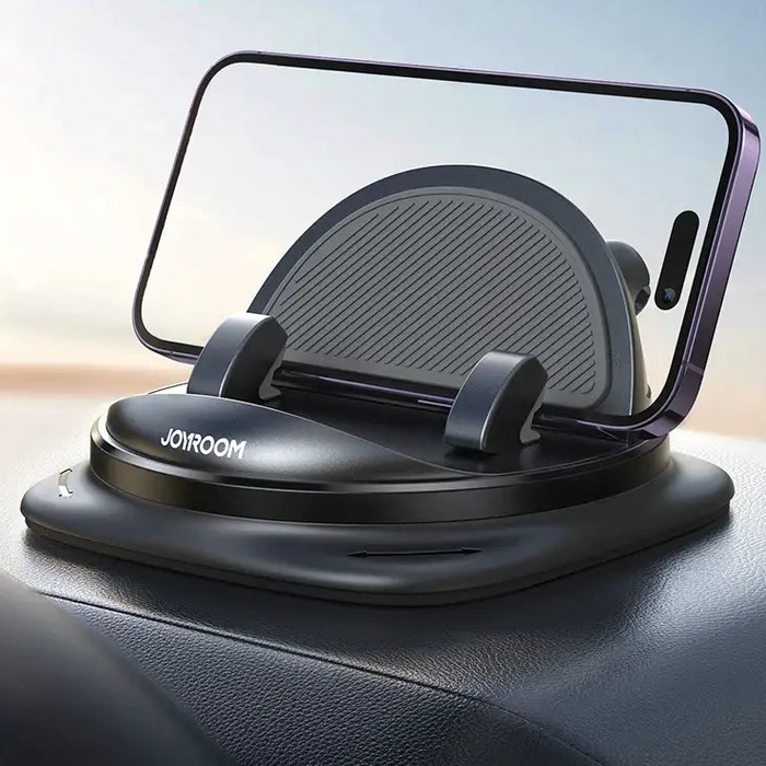 Car dashboard phone holder with a circular base and adjustable cradle for securing a smartphone.