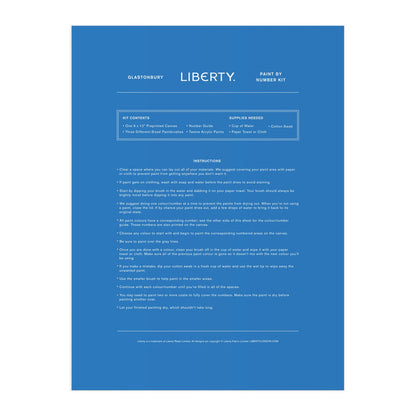 A blue instruction sheet for the Liberty London Liberty 9 x 12 Paint by Number Kit Glastonbury features centered white text with step-by-step instructions, kit contents, and needed supplies, including premium acrylic paints.