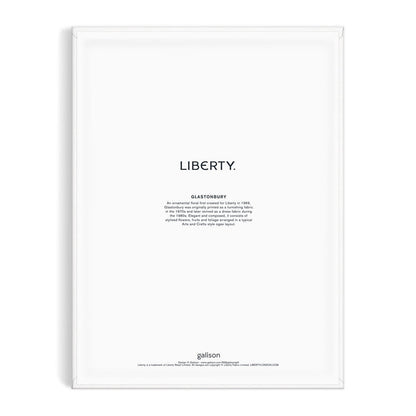 A white poster featuring “LIBERTY.” in bold black letters, a Glastonbury design description beneath, and the Liberty London logo at the bottom. Inspired by Liberty 9 x 12 Paint by Number Kit Glastonbury.