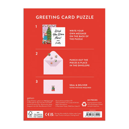 Back of Joanna Clay’s Meowy Christmas Greeting Card Puzzle box shows three steps: write a message, punch out 60 puzzle pieces, and mail. Features cat-themed art, sample card, envelope images, and festive red packaging.