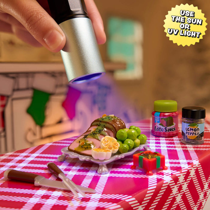 Person using a UV light on a plate of food with a festive background
