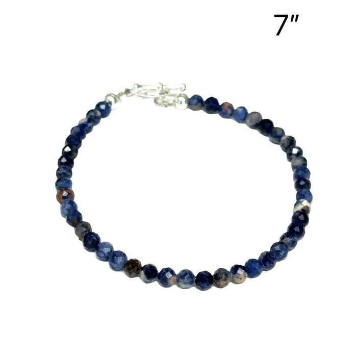 One  7'' (4mm) Micro F. Round Orange Sodalite Gemstone bracelet w/ SS toggle