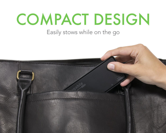Plugable USB3-6950-HDMI adapter being placed into a bag pocket, highlighting its compact design for portability.