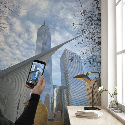 Custom wall mural featuring a NYC skyline photograph taken on a phone, transforming a workspace with an urban-inspired design.