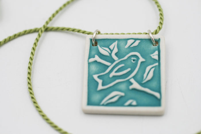 Teal Bird on Branch
