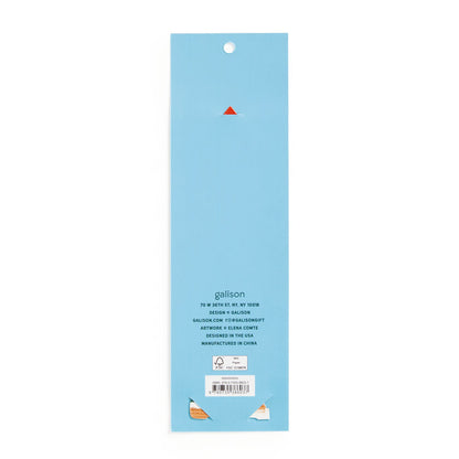 A rectangular blue package for the Seasons Tweetings Paper Bookmark by Éléna Comte, featuring a small orange triangle at the top and white text with manufacturer and contact info on a plain white background. Perfect for festive gifting.