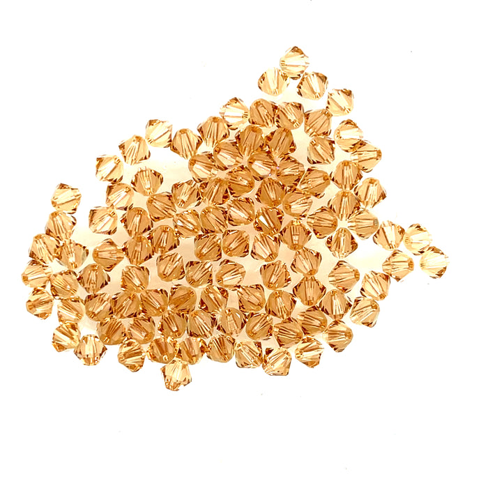 Swarovski Crystal-  Lt. Gold 100 4mm $15