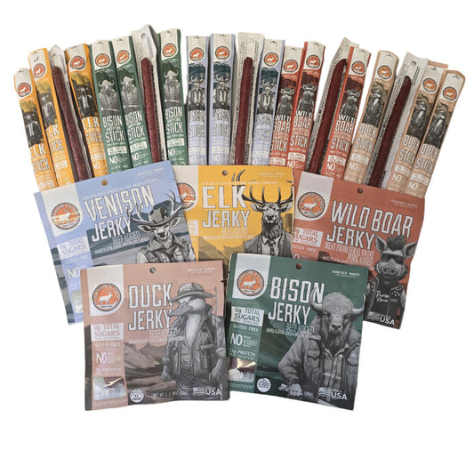 An assortment of packaged jerky and snack sticks from Pearson Ranch Jerky, featuring different exotic meats such as elk, bison, venison, wild boar, and duck.