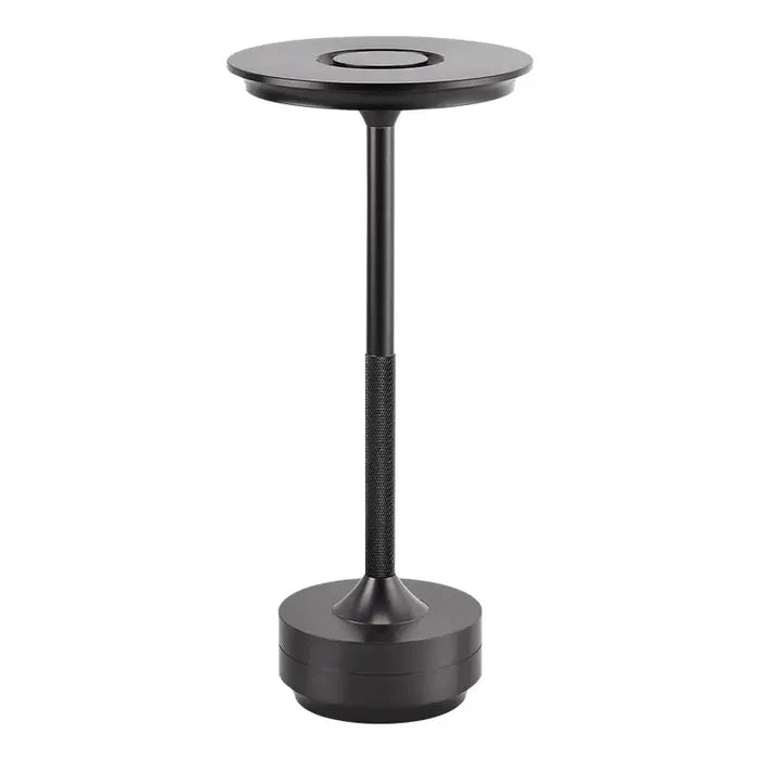 The black metal table base with a round base