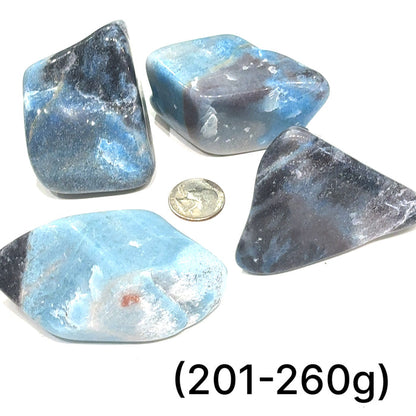 Ethically sourced tumbled Trolleite gemstone free‑form crystal for manifestation and meditation grouping of (201-260g) on white overview