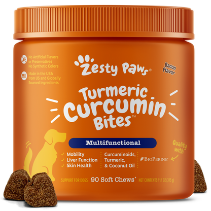 Orange jar of Zesty Paw Turmeric Curcumin Bites dog supplements with brown soft chews displayed in front.