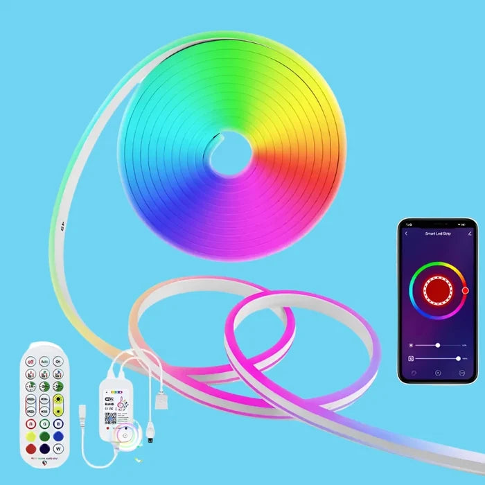 A close up of a remote control and a rainbow light