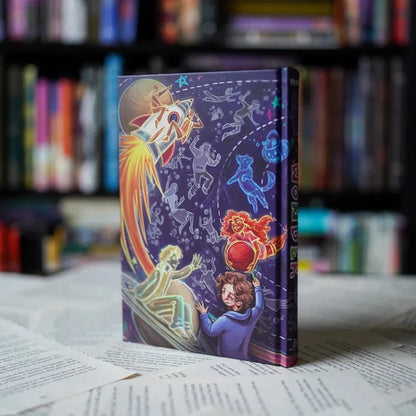Wonder Annotated Special Edition hardcover back cover and spine by R.J. Palacio — purple cosmic back cover featuring constellation illustrations, a large astronaut figure with orange flames, glowing boy reaching up, red-haired fiery girl, and blue dog constellation, with WONDER spine visible