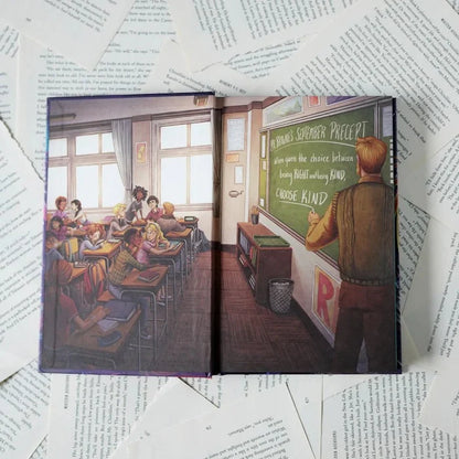 Wonder Annotated Special Edition open book spread showing the Choose Kind classroom illustration — students at desks with Mr. Browne writing 'CHOOSE KIND' on the chalkboard, book displayed open on scattered book pages