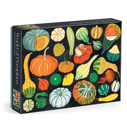 The World of Pumpkins 1000 Piece Puzzle by Dawn Cooper showcases vibrant botanical art of diverse pumpkins and gourds on a striking black background.