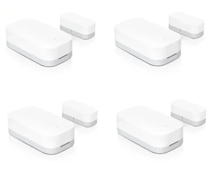 Four different views of a door window sensor