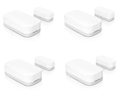 Four different views of a door window sensor