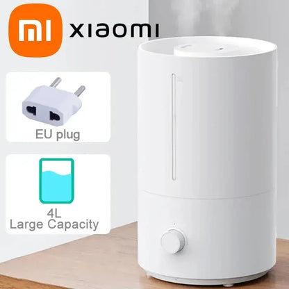 A close up of a humider on a table with a phone