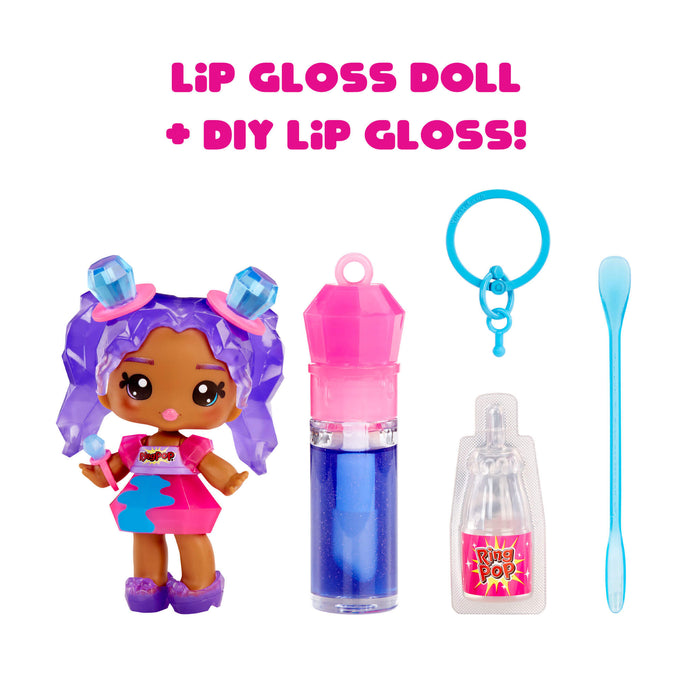 Lip gloss doll and DIY lip gloss kit with pink and blue items on a white background